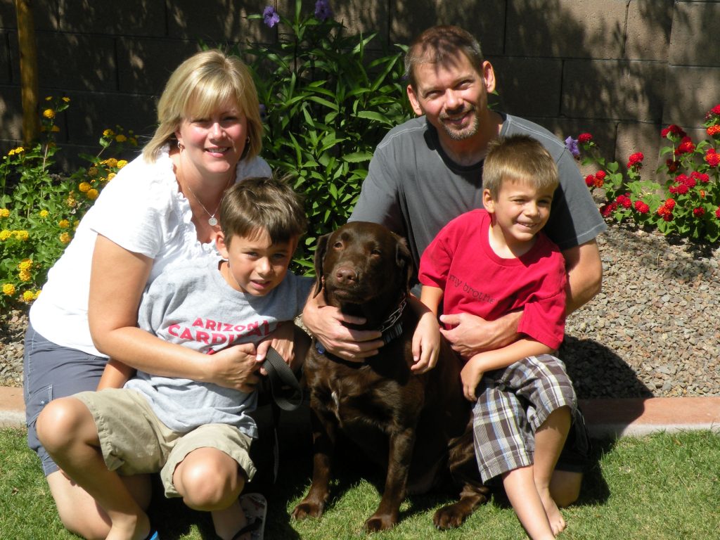 family with trained dog after doggie steps dog training with mark siebel